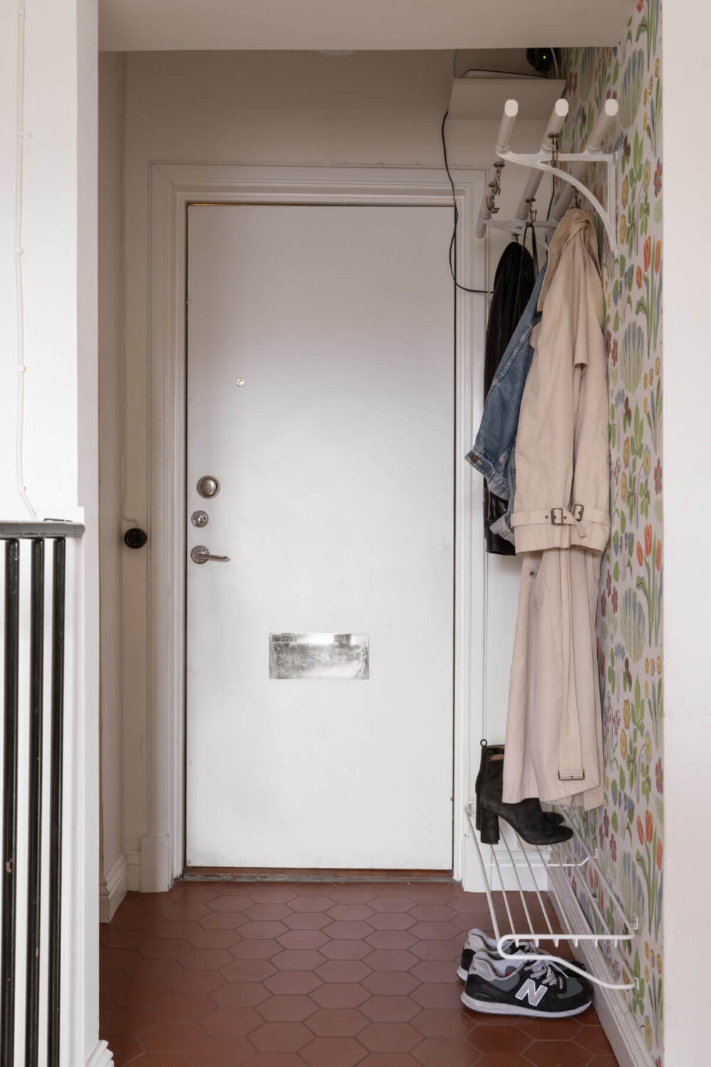 A Swedish Maisonette Apartment with Basement Bedrooms 26 hall terracotta hexagon tiles wallpaper A Swedish Maisonette Apartment with Basement Bedrooms