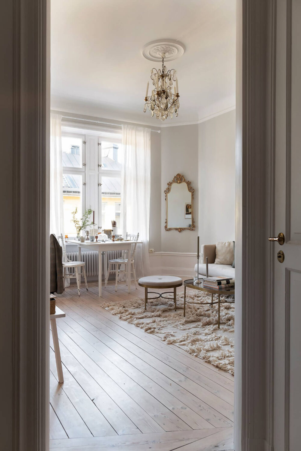 A Small Light Gray Apartment with Period Features 19 hall view into living room