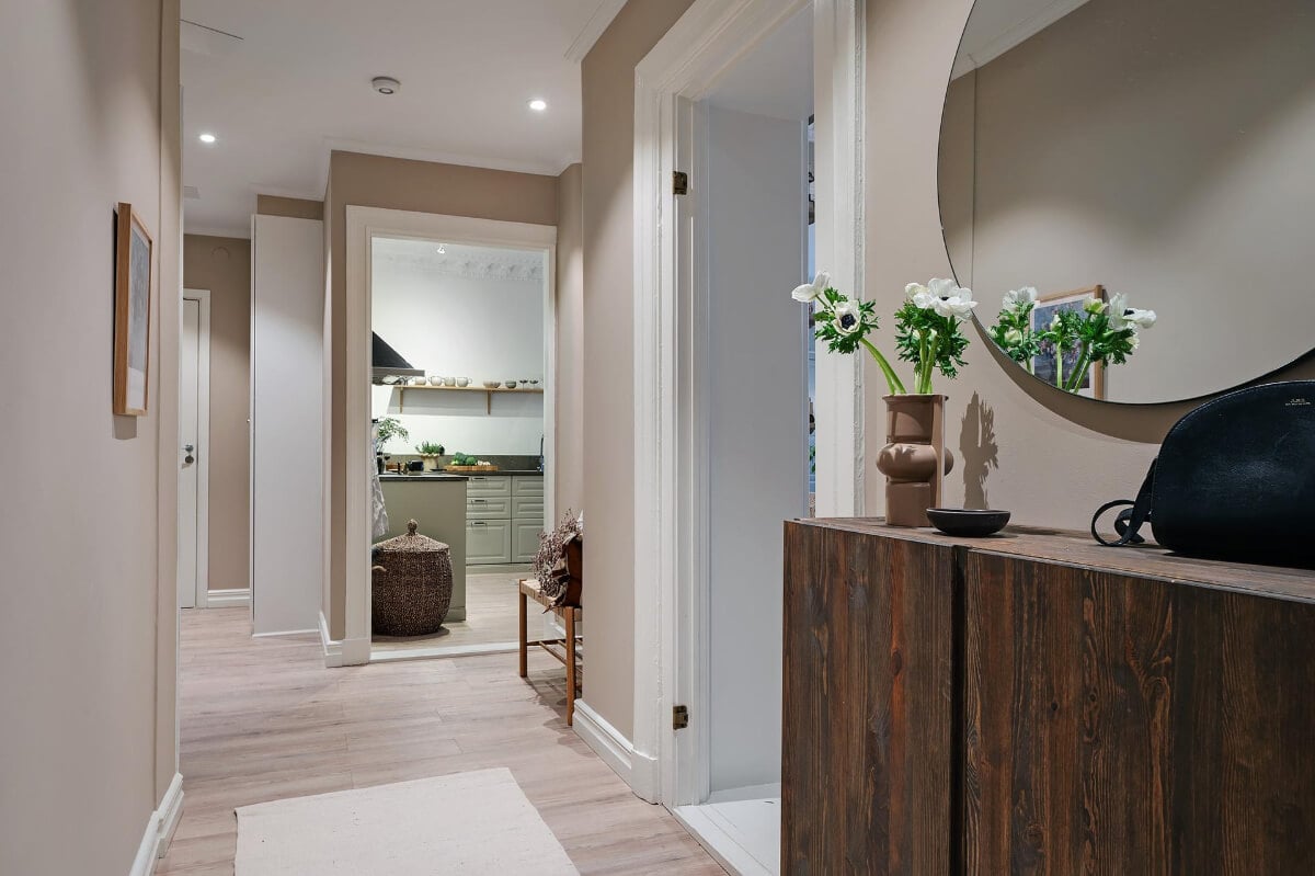 Warm and Inviting Rooms in a Renovated Swedish Apartment 29 hall warm beige walls