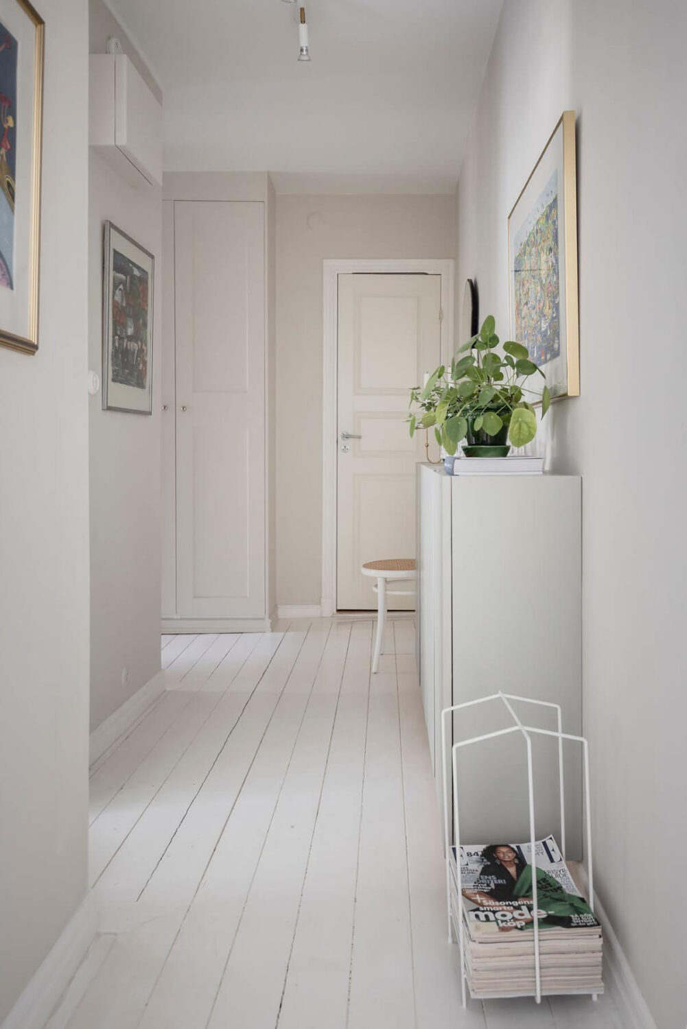 White-Painted Floorboards in a Turn-of-the-Century Apartment 26 hall white painted floorboards