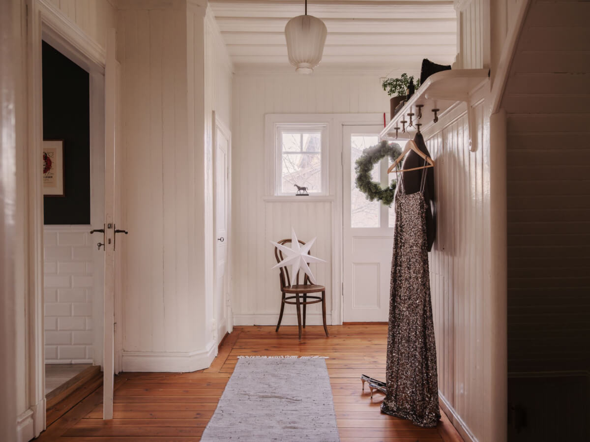 A Beautiful Turn-of-the-Century Family Home in Sweden 41 hall white walls wooden floor