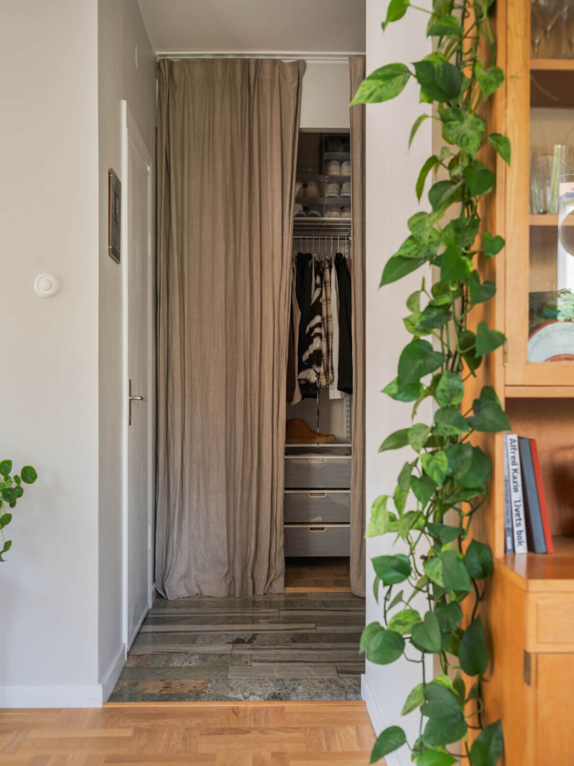 A Swedish 1940s Apartment with Lovely Balcony Views 13 hall with wardrobe niche curtain