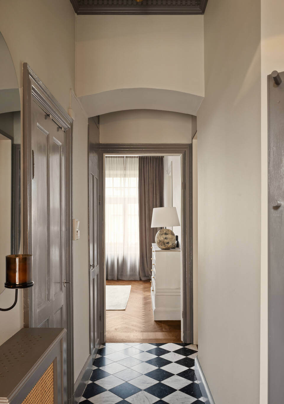 Beautiful Period Features in a One-Bedroom Stockholm Apartment 10 hallway checkerboard floor