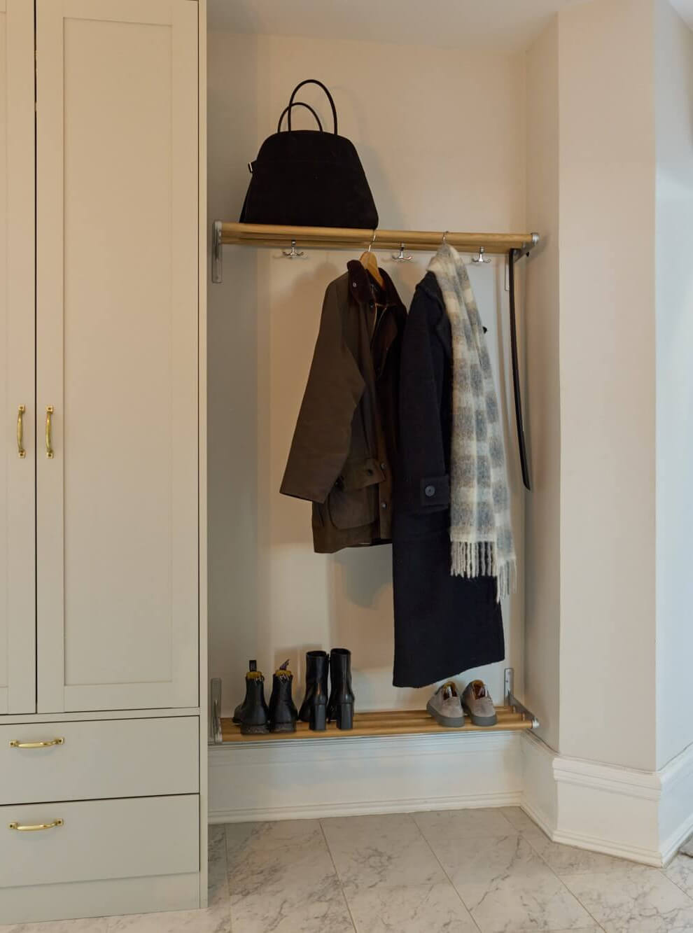 An Elegant Apartment with Period Features and Contemporary Elements 13 hallway floor to ceiling cabinets and niche for coats