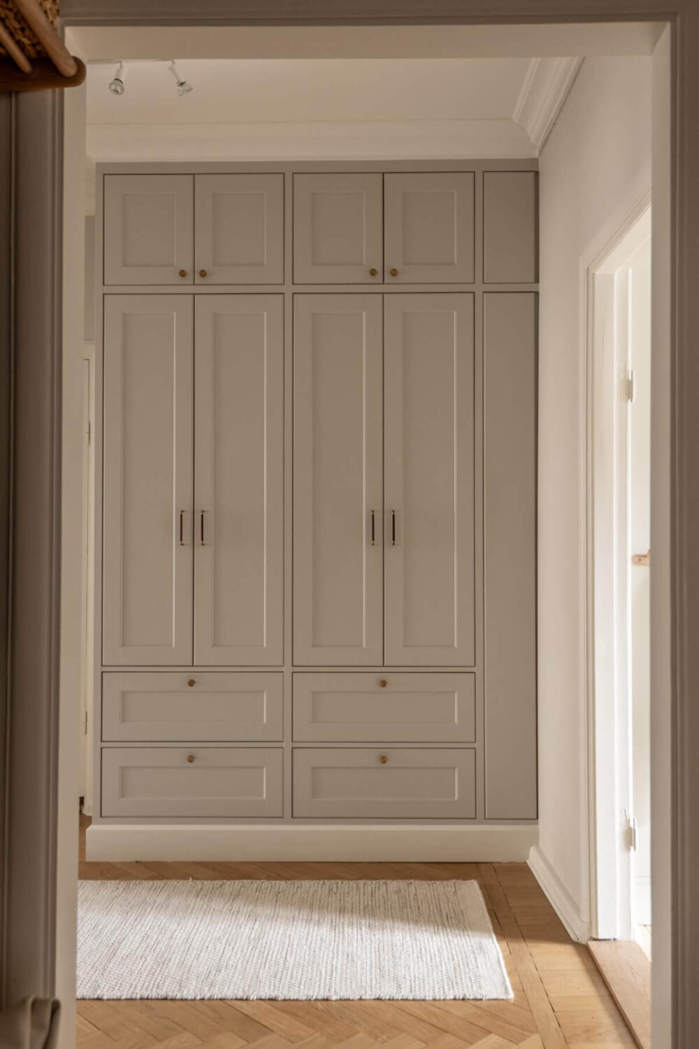 A Beautiful Calm 1920s Apartment in Gothenburg 21 hallway foor-to-ceiling wardrobes