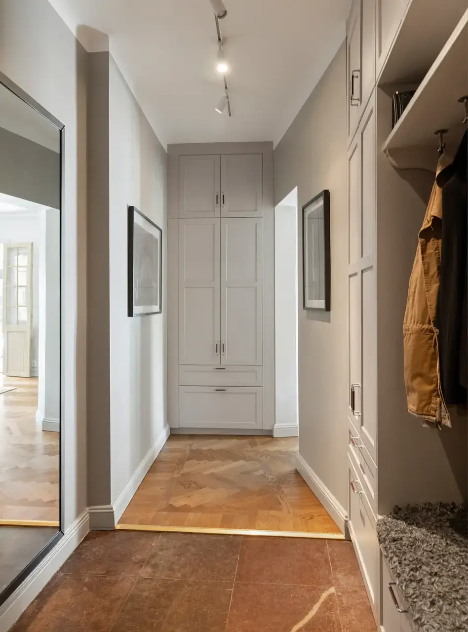 A Charming Ground Floor Family Apartment in Stockholm 21 hallway large mirror tile floor