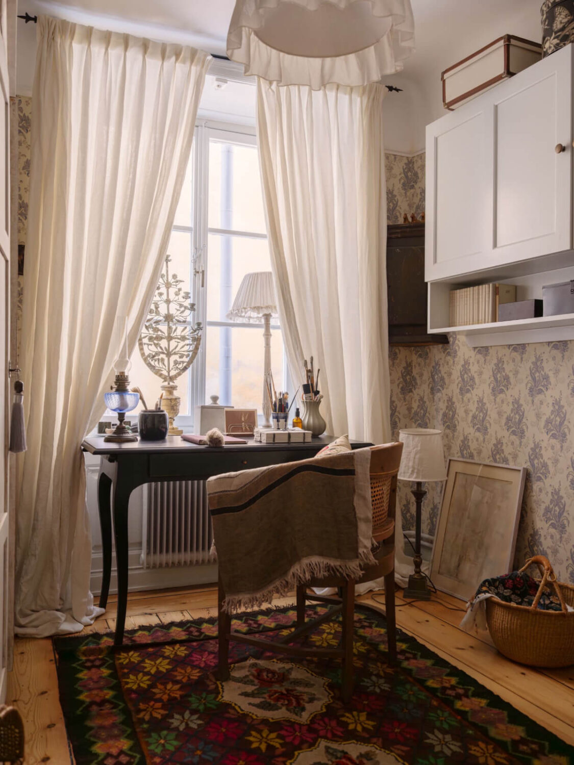 A Charming Home in a 17-Century Apartment in Stockholm's Old Town 22 home office with desk under window