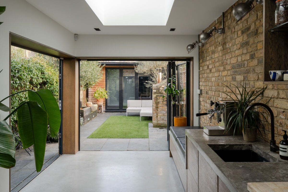 A Restored Victorian House with Exposed Brick and a Kitchen Extension 9 kitchen bifolding doors garden