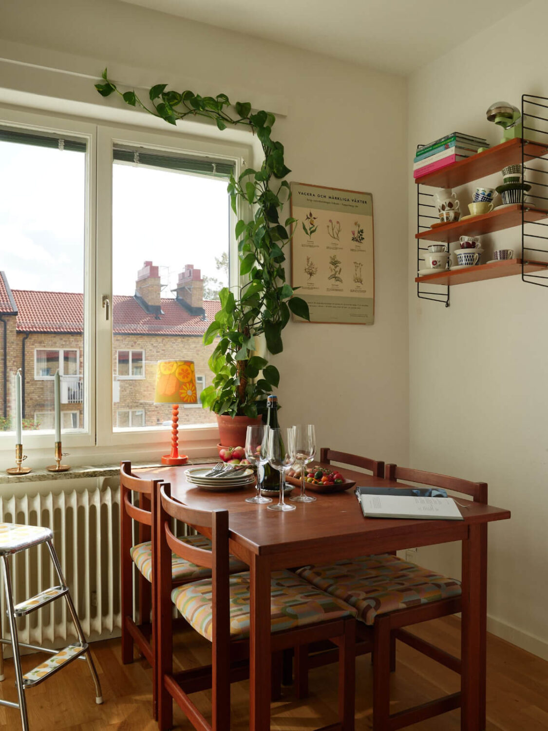 A Charming Midcentury Apartment with Original Features 15 kitchen dining table