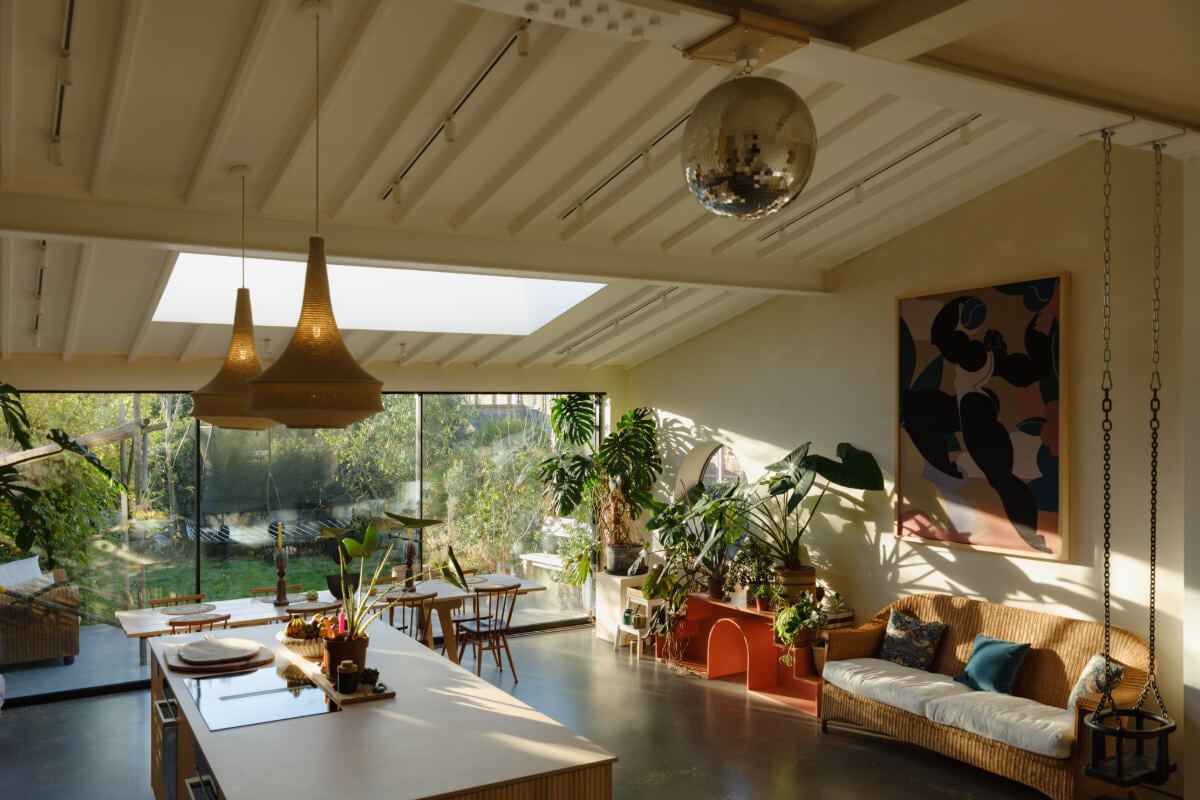 A London Edwardian House with a Light-Filled Kitchen Extension 10 kitchen extension with dining table and seating