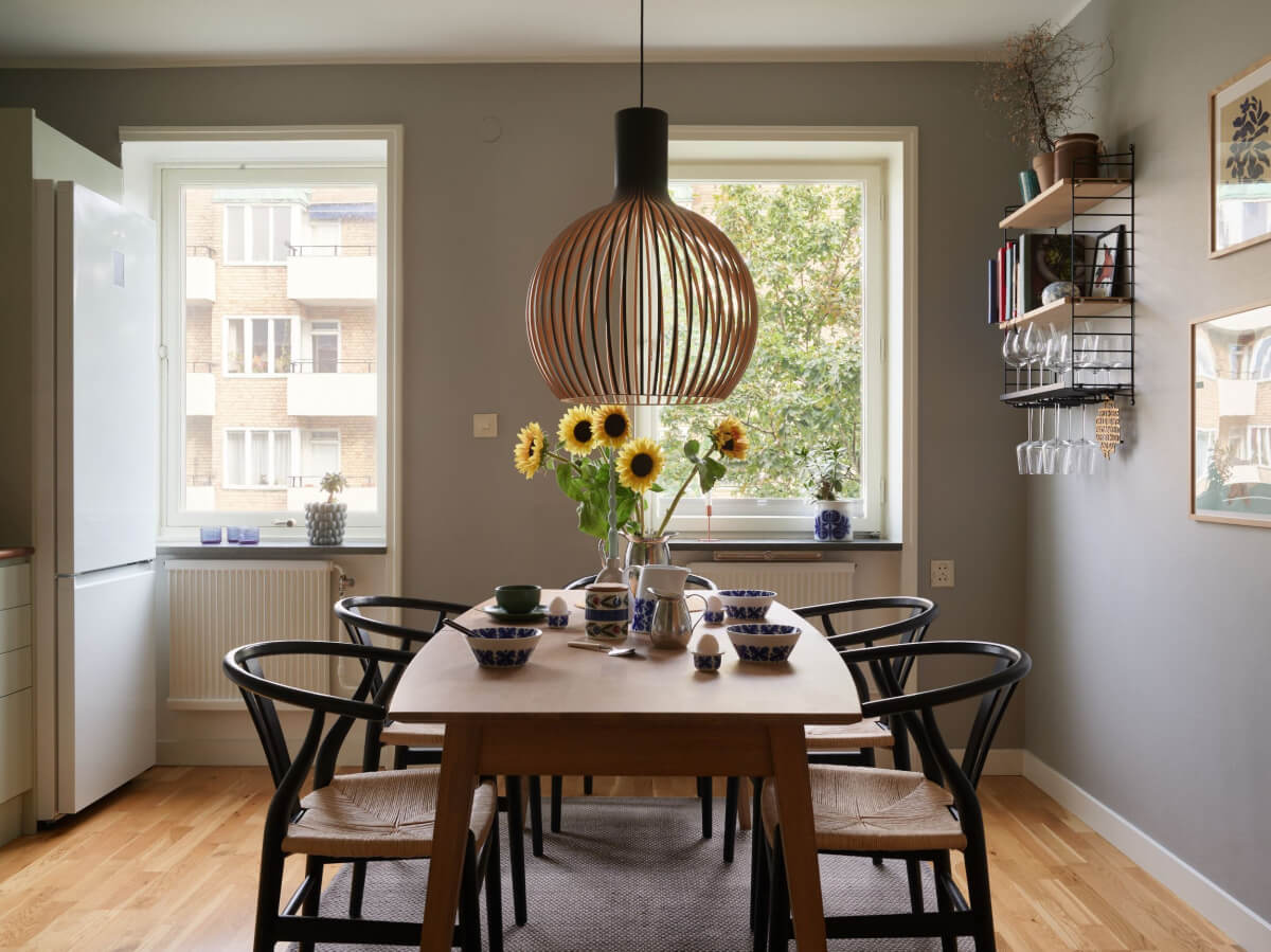A Charming Two-Bedroom Corner Apartment in a 1940s Building 8 kitchen large dining table