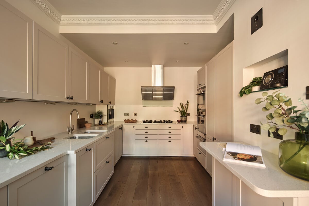 A Stunning Victorian House with Period Features and Surprising Spaces 11 kitchen light cabinets wooden floor