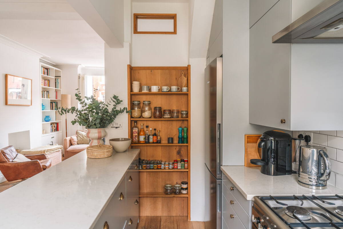 A Charming Light Edwardian House with a Tiny Garden 9 kitchen open wooden cabient