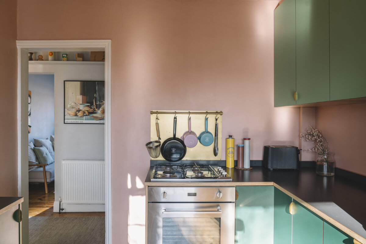 A London Apartment with a Pink and Green Kitchen 9 kitchen pink walls green cabinets