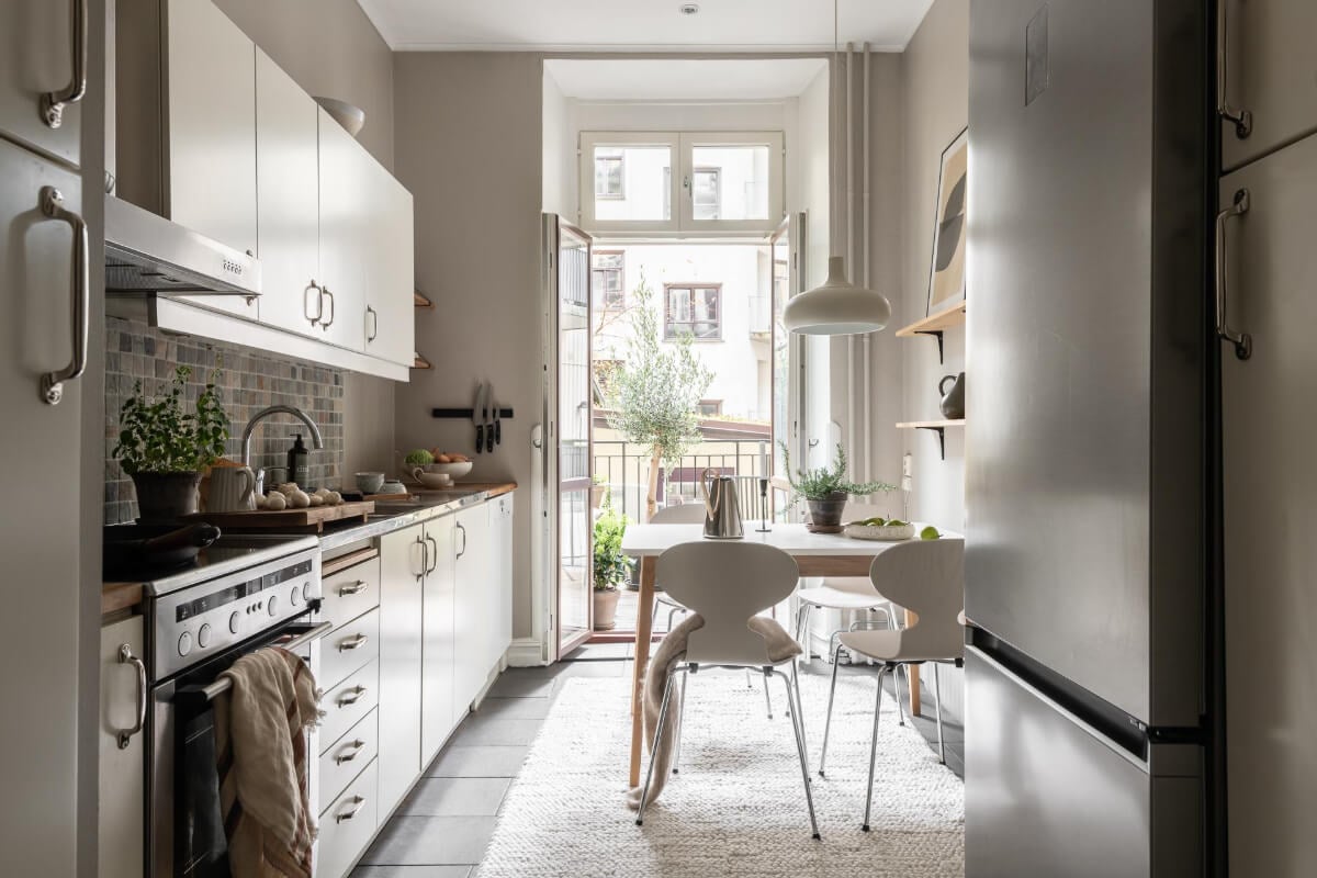 A Serene Studio Apartment with a Loft Bed and a Large Balcony 10 kitchen white cabinets gray walls