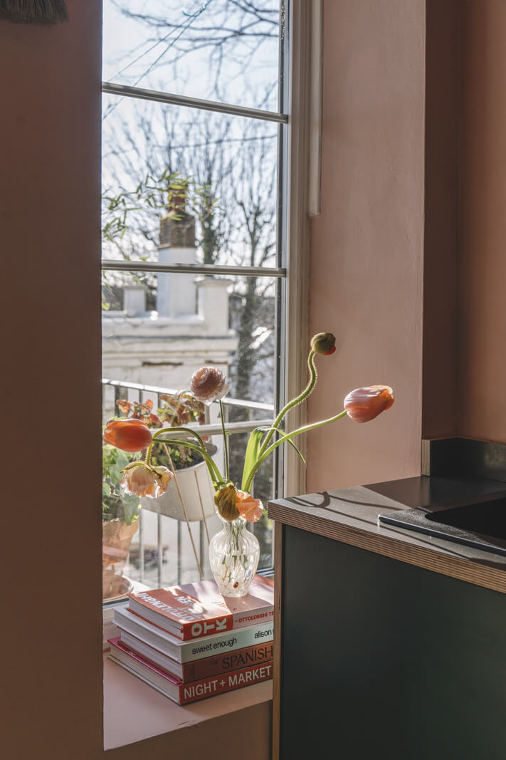 A London Apartment with a Pink and Green Kitchen 7 kitchen window