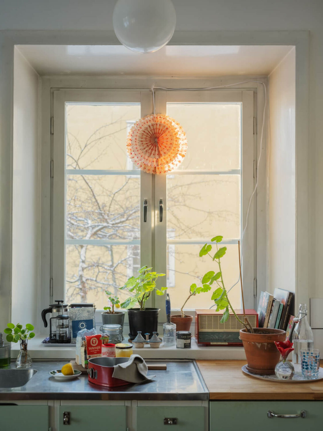 A Charming and Light-Filled Studio Apartment in Stockholm 11 kitchen window