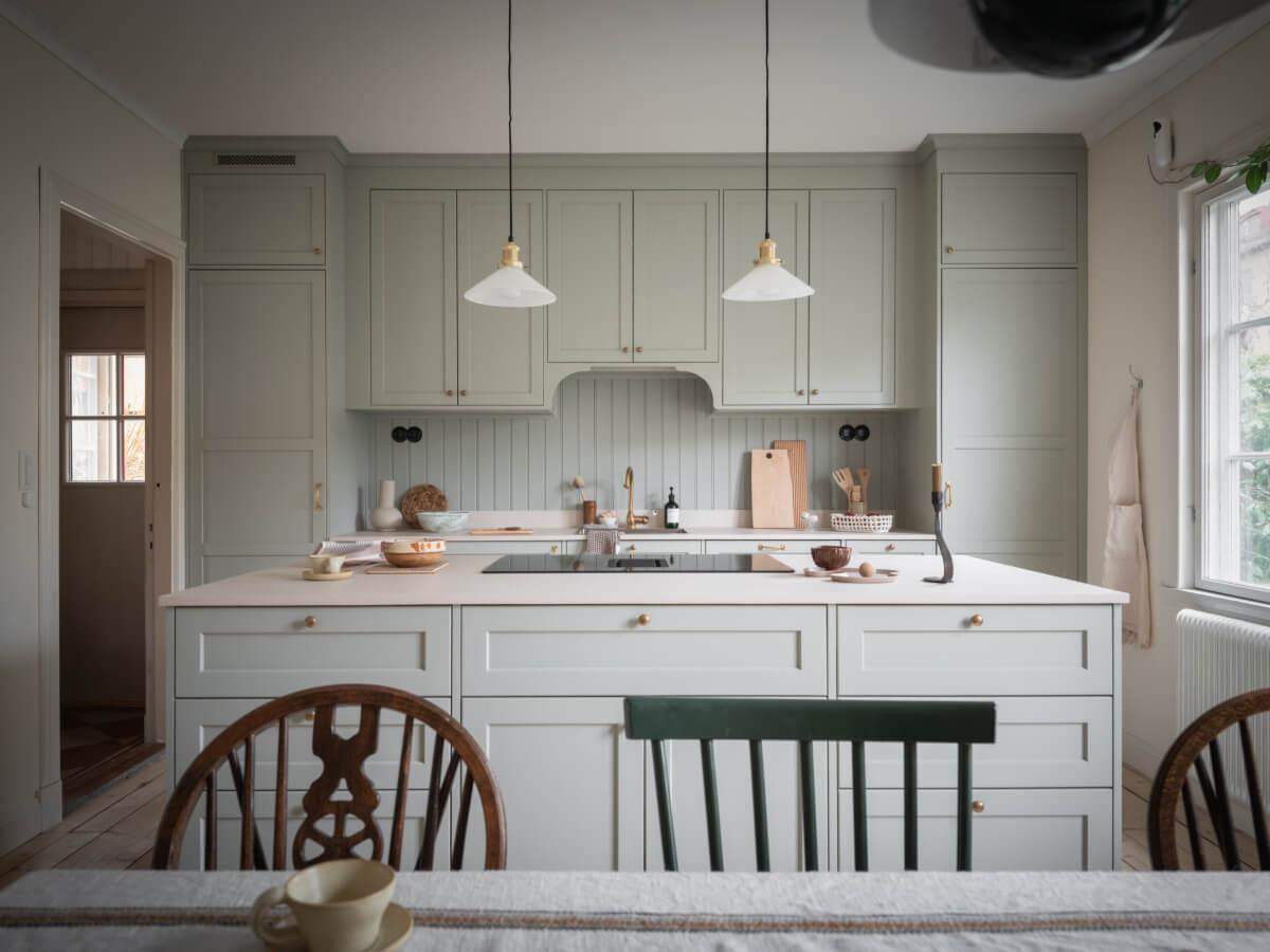 A Carefully Renovated Family Home in Sweden 12 brass fittings kitchen detail