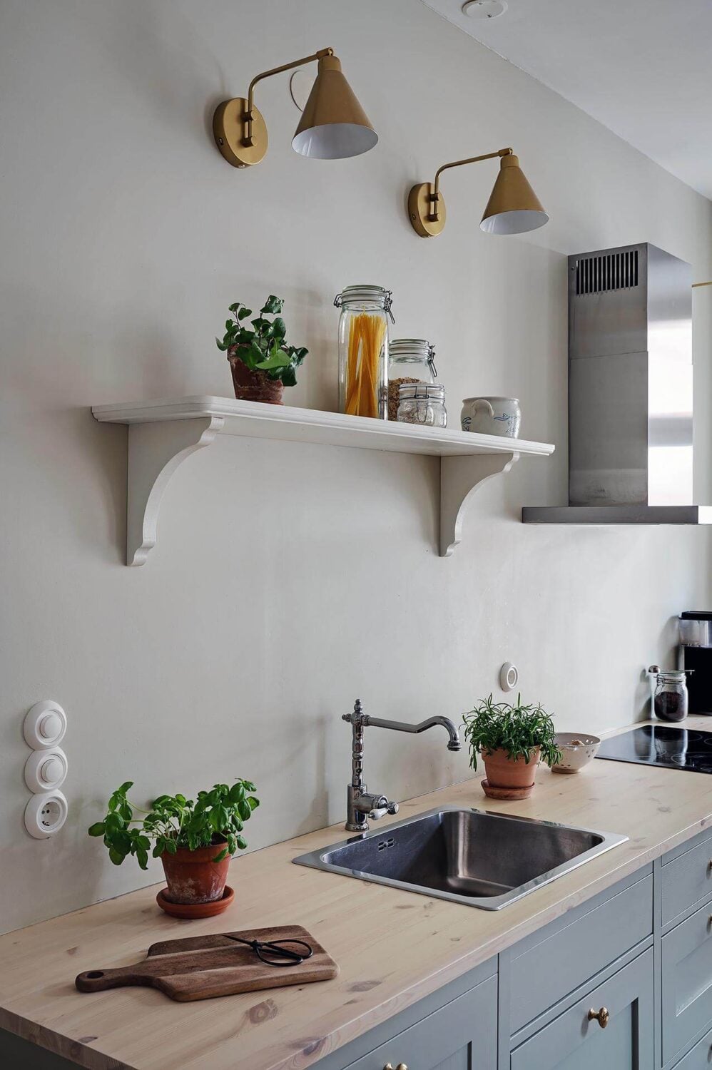 A Swedish Apartment with an Open Living Space and Period Features 14 kitchen with shelf