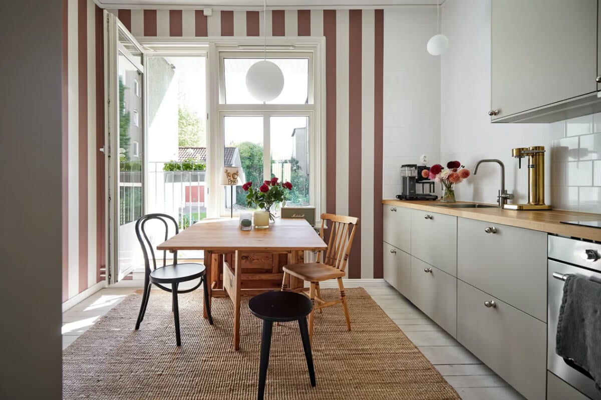 A Bright Turn-of-the-Century Apartment in Sweden 6 kitchen with striped wallpaper