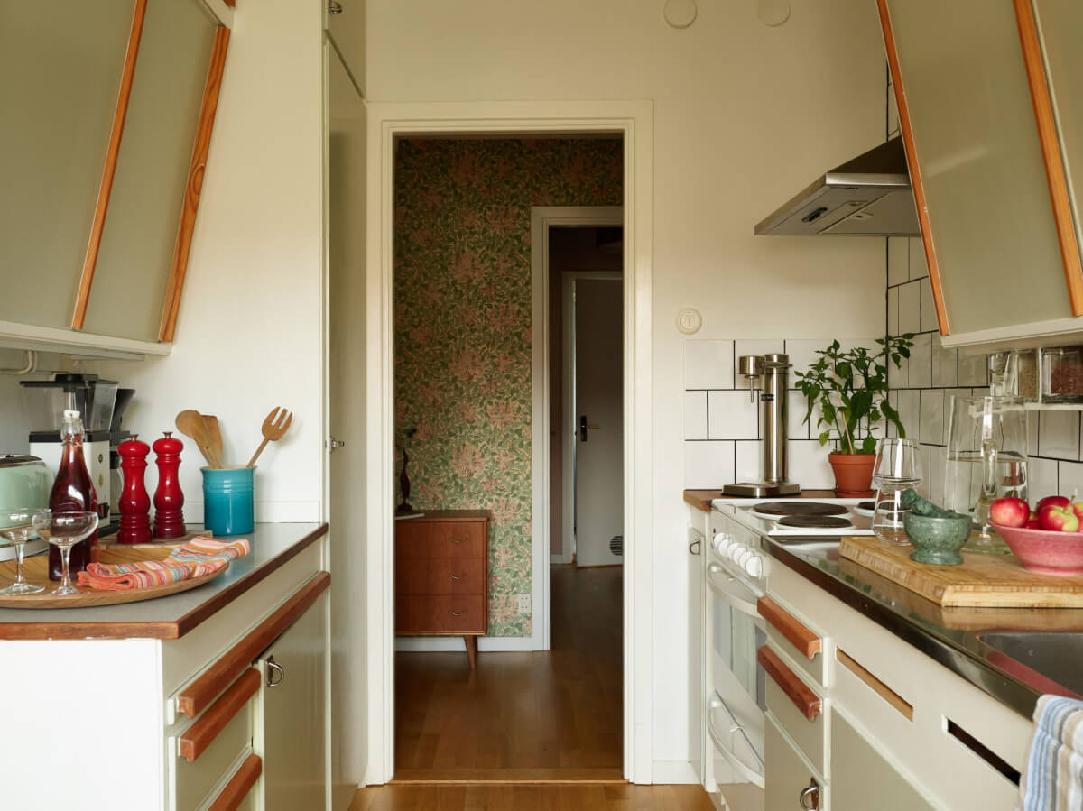 A Charming Midcentury Apartment with Original Features 13 kitchen with view of hall