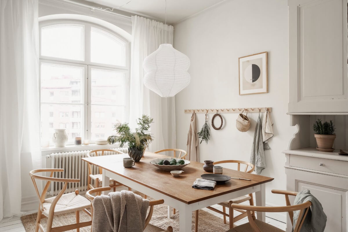A Stylish Studio Apartment with Period Features and Large Windows 16 large dining table kitchen