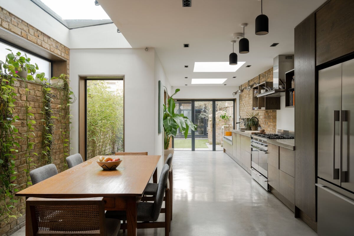 A Restored Victorian House with Exposed Brick and a Kitchen Extension 8 large extended kitchen with brick walls and skylights