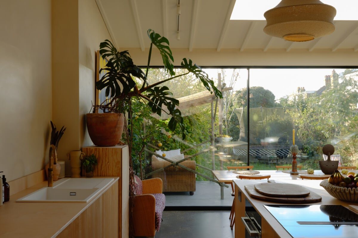A London Edwardian House with a Light-Filled Kitchen Extension 7 large glass sliding doors open plan kitchen space