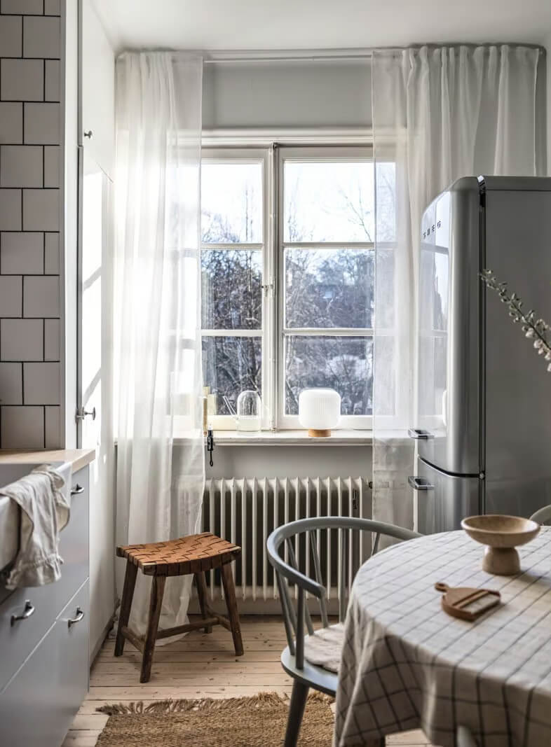 A Beige Studio Apartment with a Bright Kitchen 10 large kitchen window