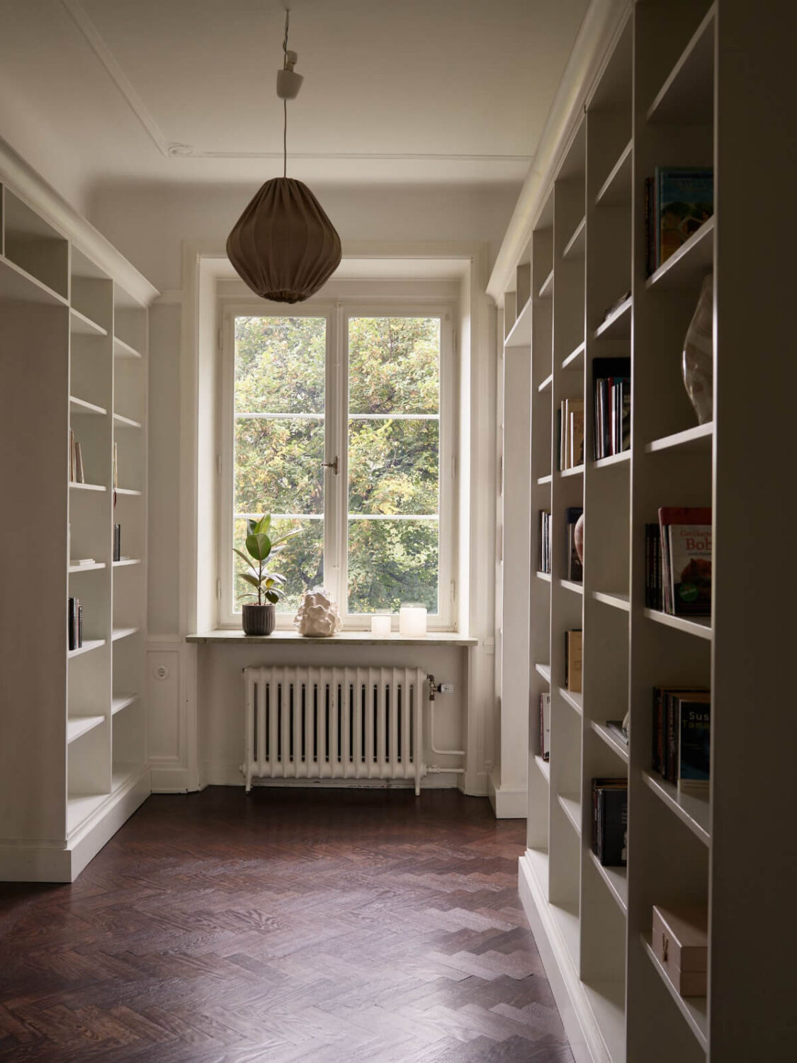 A Grand Early 20th-Century Apartment in Stockholm 12 library room