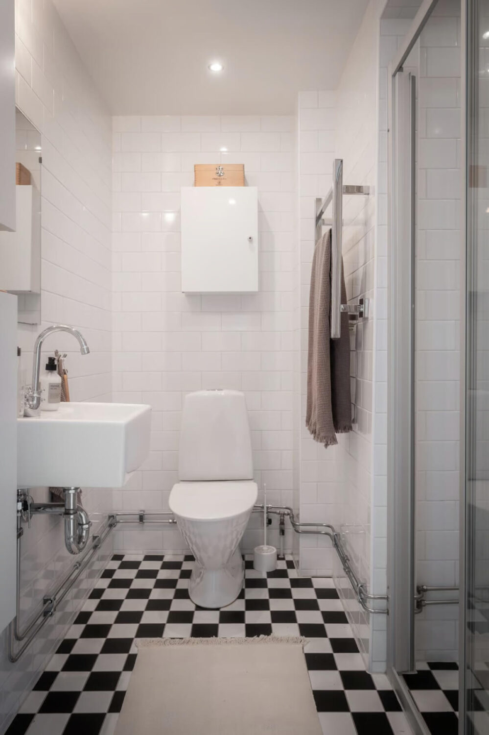 A Duplex Apartment with Period Features and a Charming Attic Bedroom 15 light bathroom checkerboard floor A Duplex Apartment with Period Features and a Charming Attic Bedroom