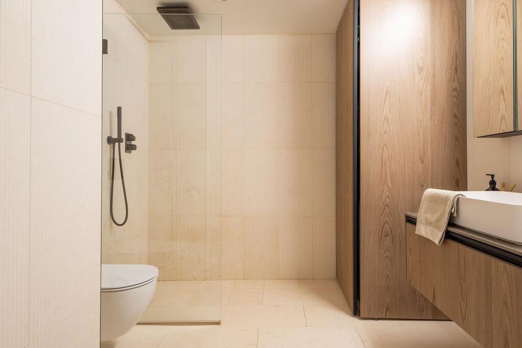A Loft with High Ceilings and Large Windows in an Exclusive Stockholm Building 9 light bathroom textured tiles