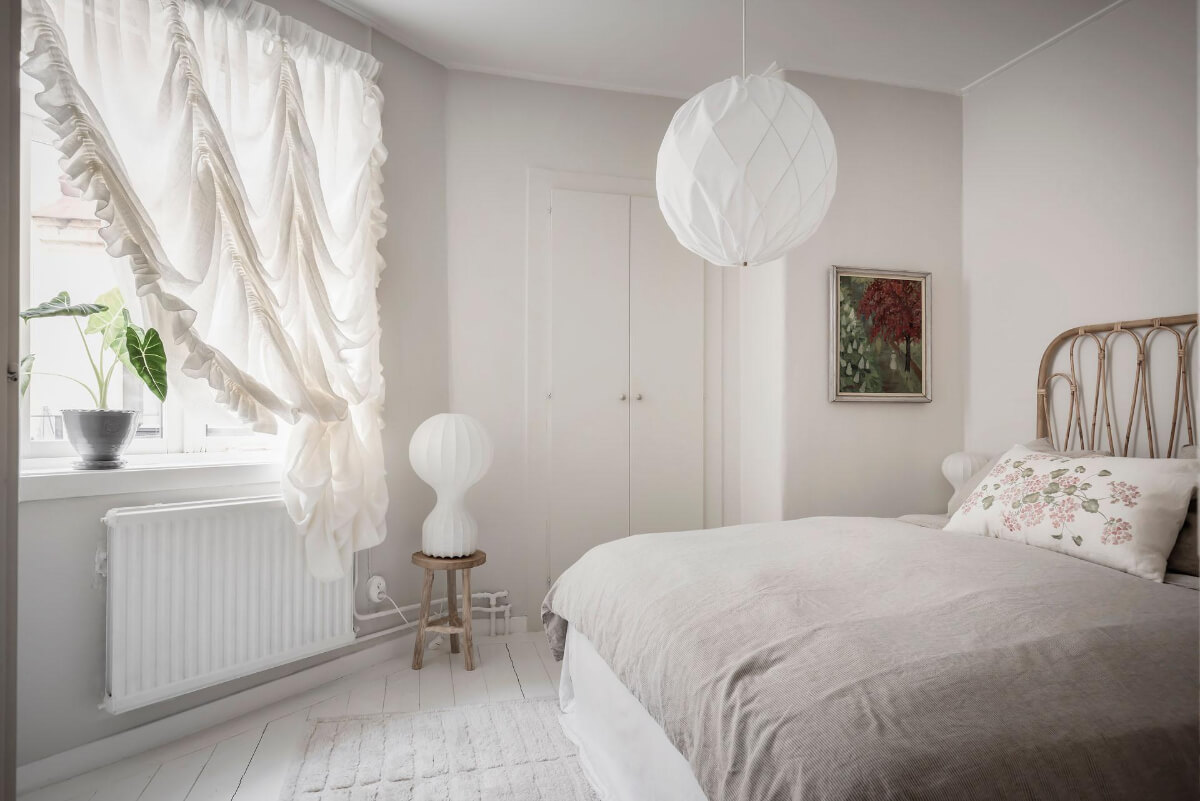 White-Painted Floorboards in a Turn-of-the-Century Apartment 20 light bedroom built-in wardrobes frilly curtains