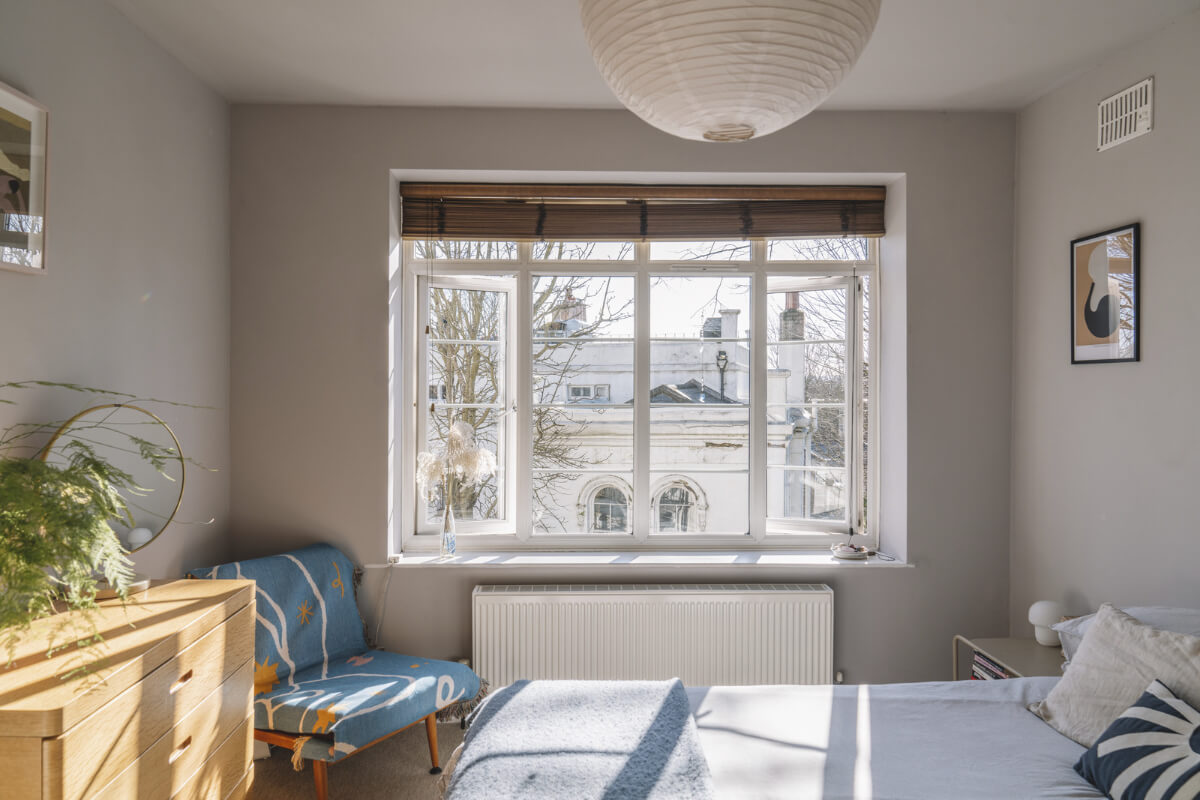 A London Apartment with a Pink and Green Kitchen 14 light gray bedroom large window