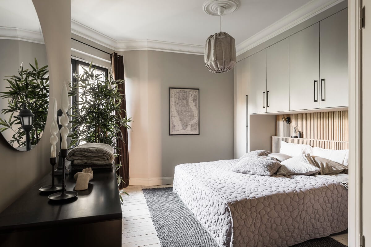 A Swedish Apartment with Exclusive Materials and Monochrome Color Scheme 18 light gray bedroom wooden feature wall