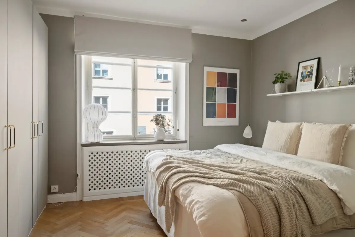 A Charming Ground Floor Family Apartment in Stockholm 16 light gray bedroom