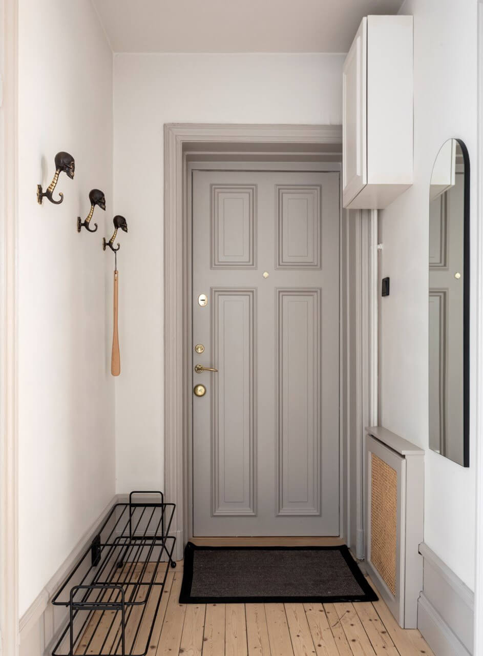 A Stylish Two-Bedroom Apartment in Stockholm 25 light gray front door A Stylish Two-Bedroom Apartment in Stockholm