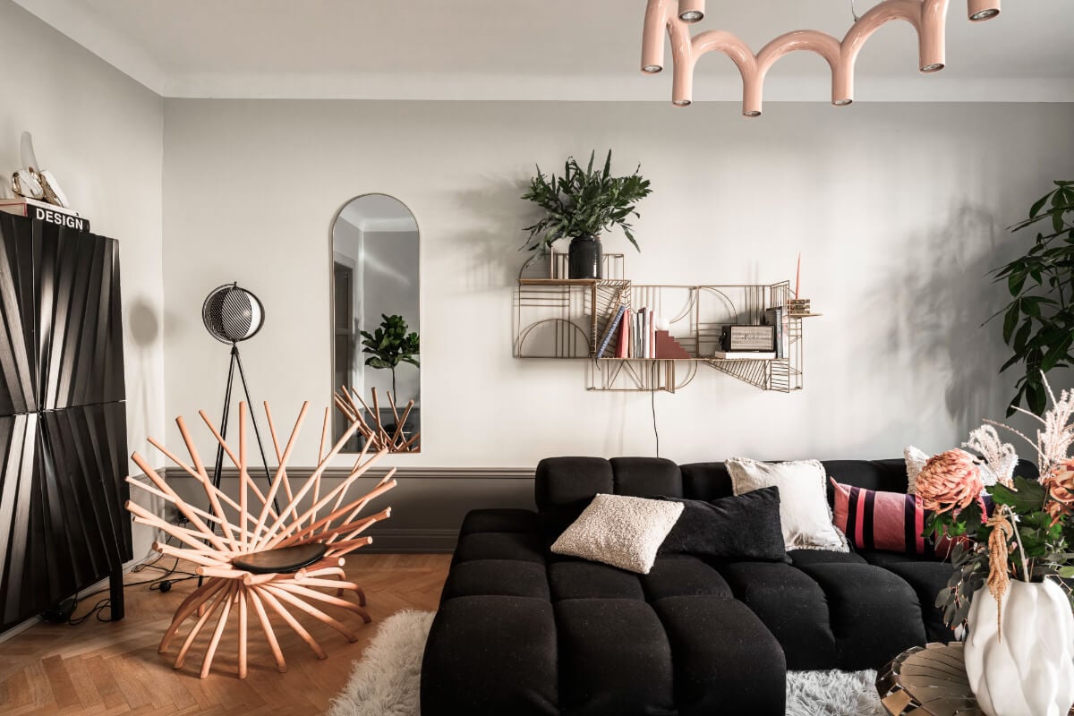 A Swedish Apartment with Exclusive Materials and Monochrome Color Scheme 3 light gray living room black sofa