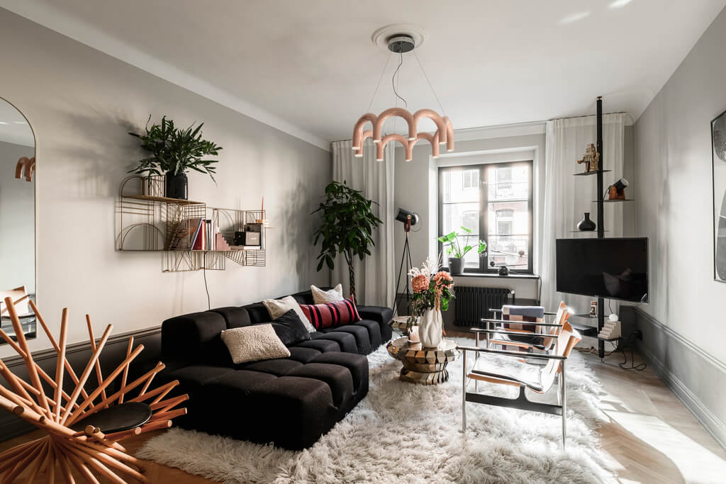 A Swedish Apartment with Exclusive Materials and Monochrome Color Scheme 1 light gray living room large rug