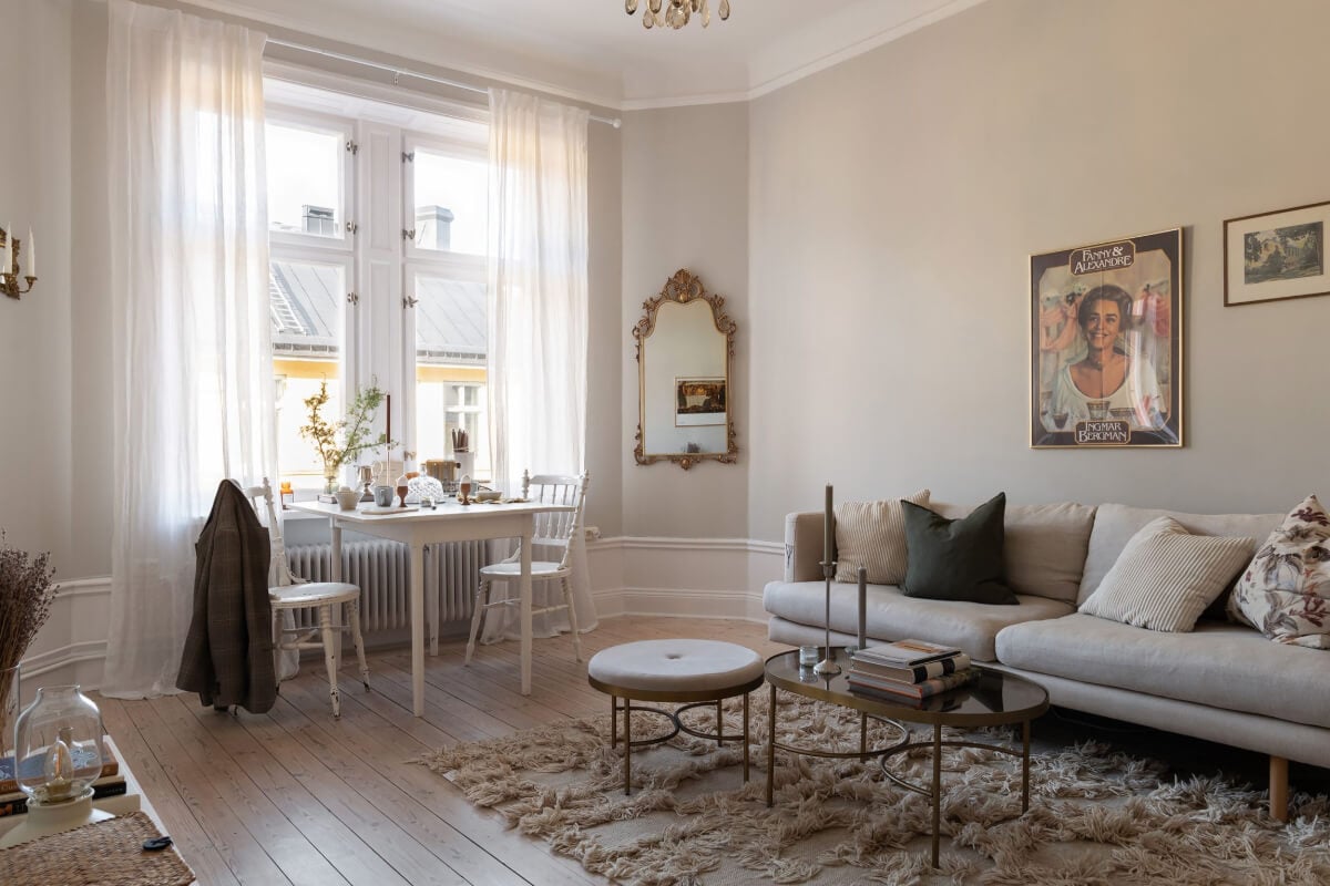 A Small Light Gray Apartment with Period Features 1 light gray walls living room