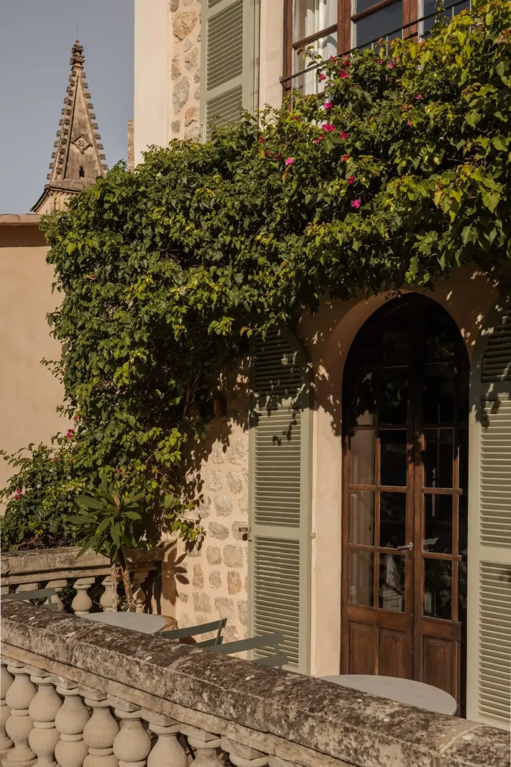 Old-World Craftsmanship and Contemporary Elegance in a Mallorcan Townhouse 13 light green shutters mallorcan townhouse