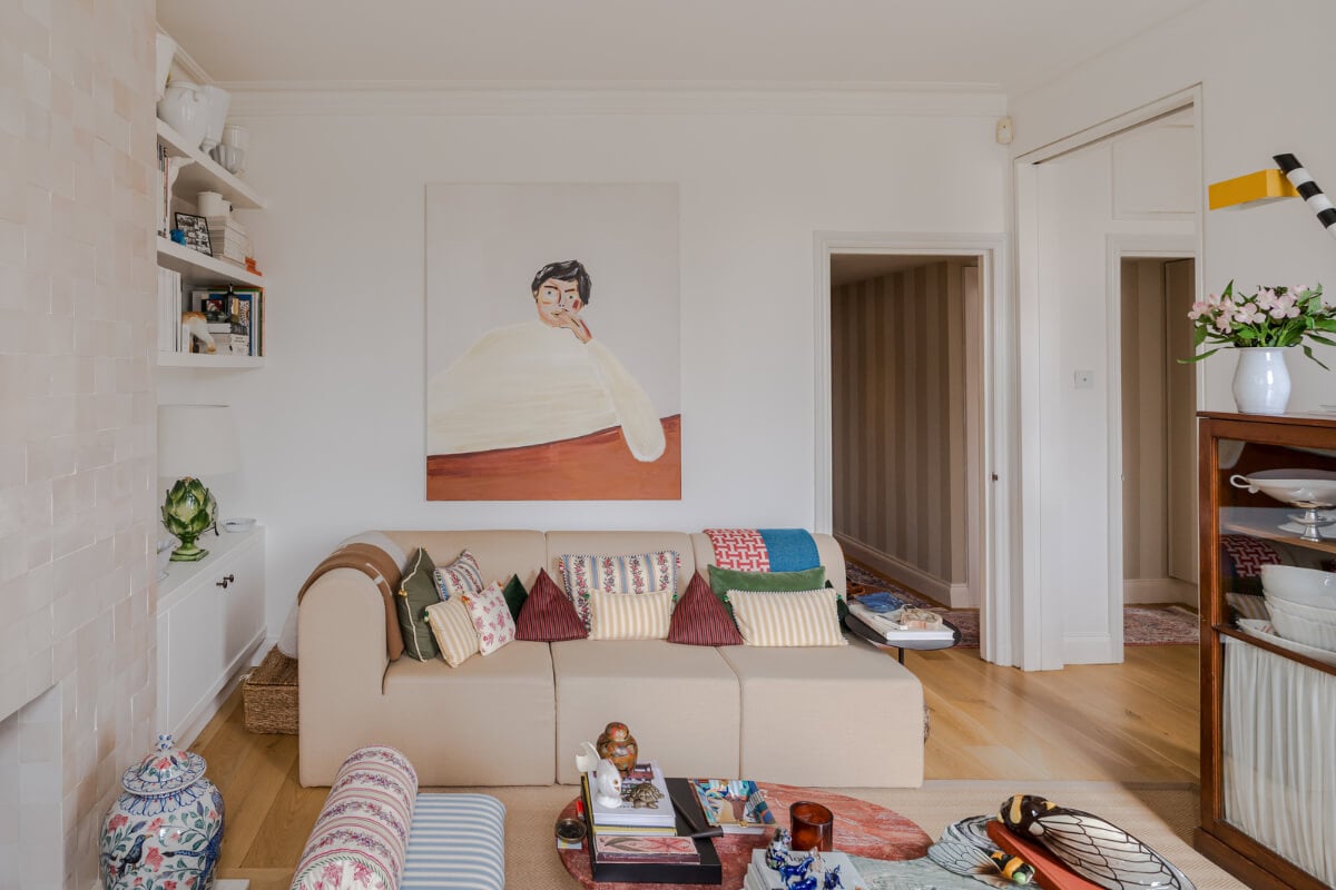 Cozy Contemporary Spaces in a Light-Filled Victorian Apartment 6 light living room bookshelves