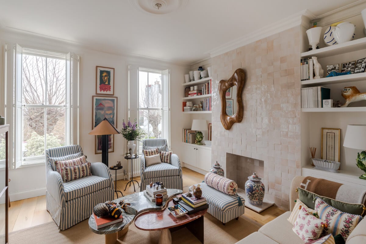 Cozy Contemporary Spaces in a Light-Filled Victorian Apartment 1 light living room large windows light pink tiles