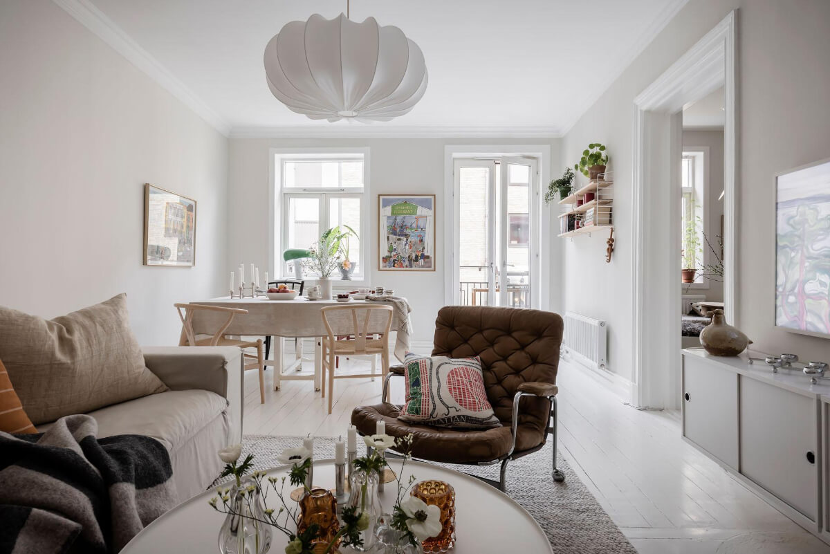 White-Painted Floorboards in a Turn-of-the-Century Apartment 4 light living room white-painted floorboards