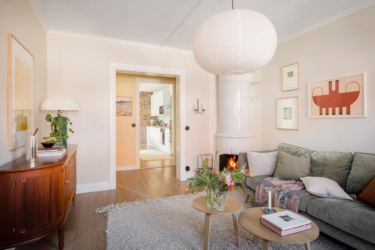 Bright Rooms with Light Color Tones in a Swedish Apartment 9 light living room with fireplace
