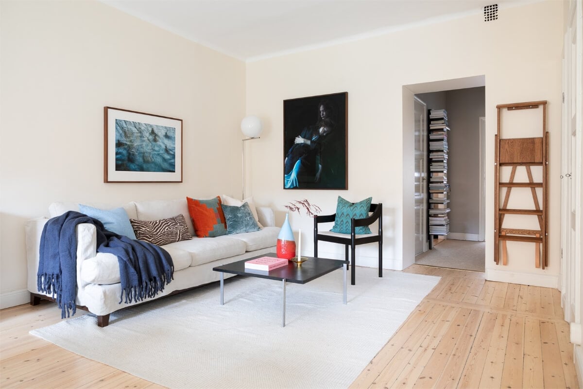 A Light-Filled Two Bedroom Apartment in Stockholm 11 light living room wooden floor
