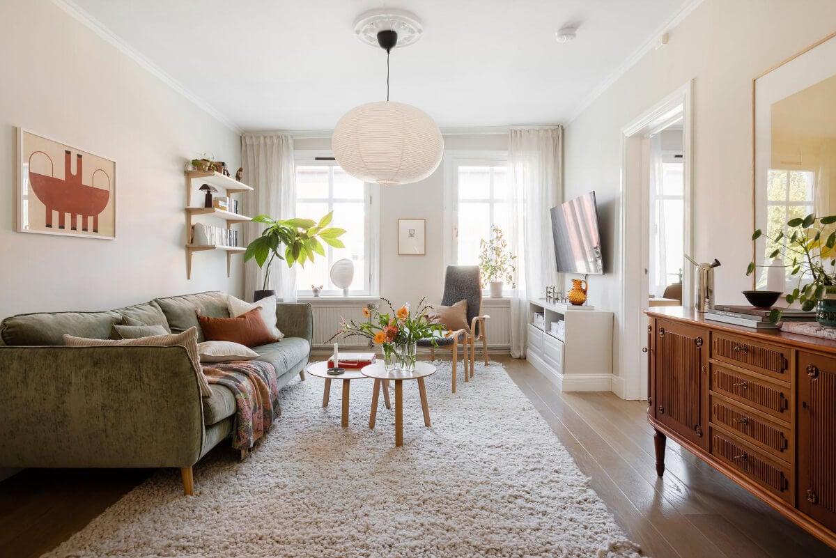 Bright Rooms with Light Color Tones in a Swedish Apartment 1 light living room wooden floor large rug