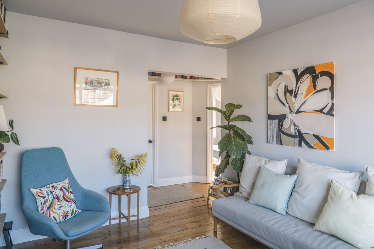 A London Apartment with a Pink and Green Kitchen 5 light living room wooden floor