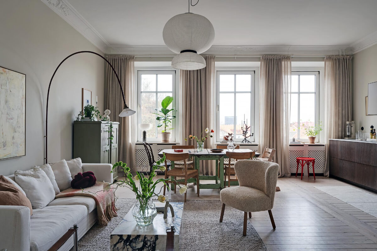 Period Features and Modern Materials in a Swedish Apartment 1 light open plan living room