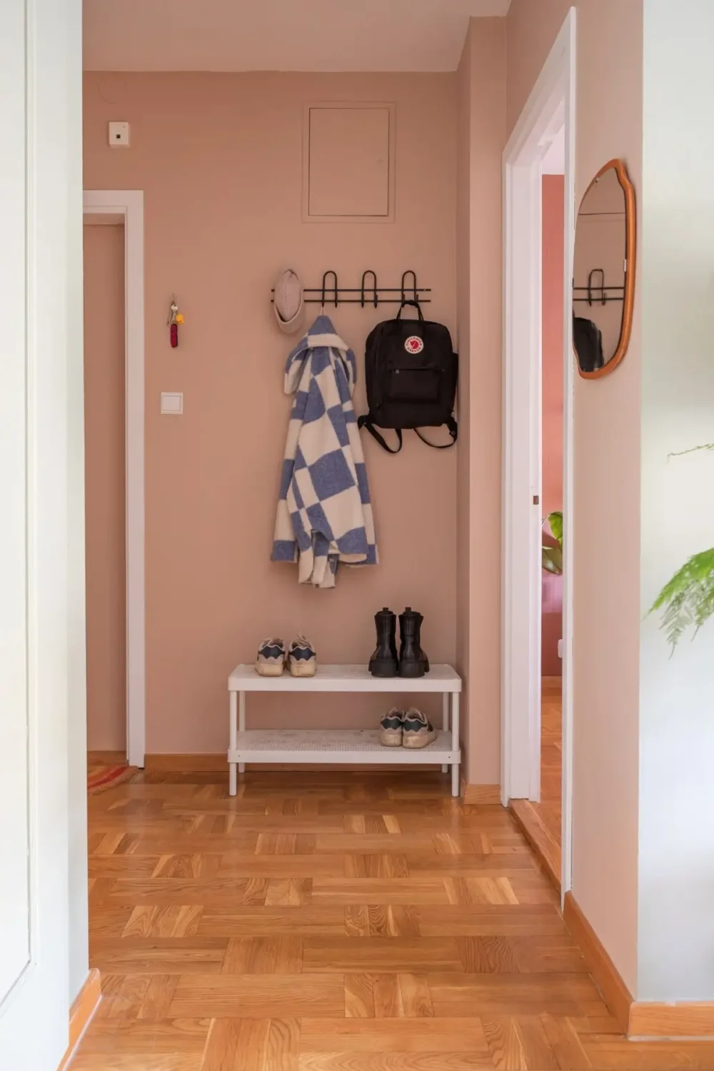 A Swedish Apartment with a Dutch Parquet Floor and Terracotta Bedroom 19 light pink hall dutch parquet floor